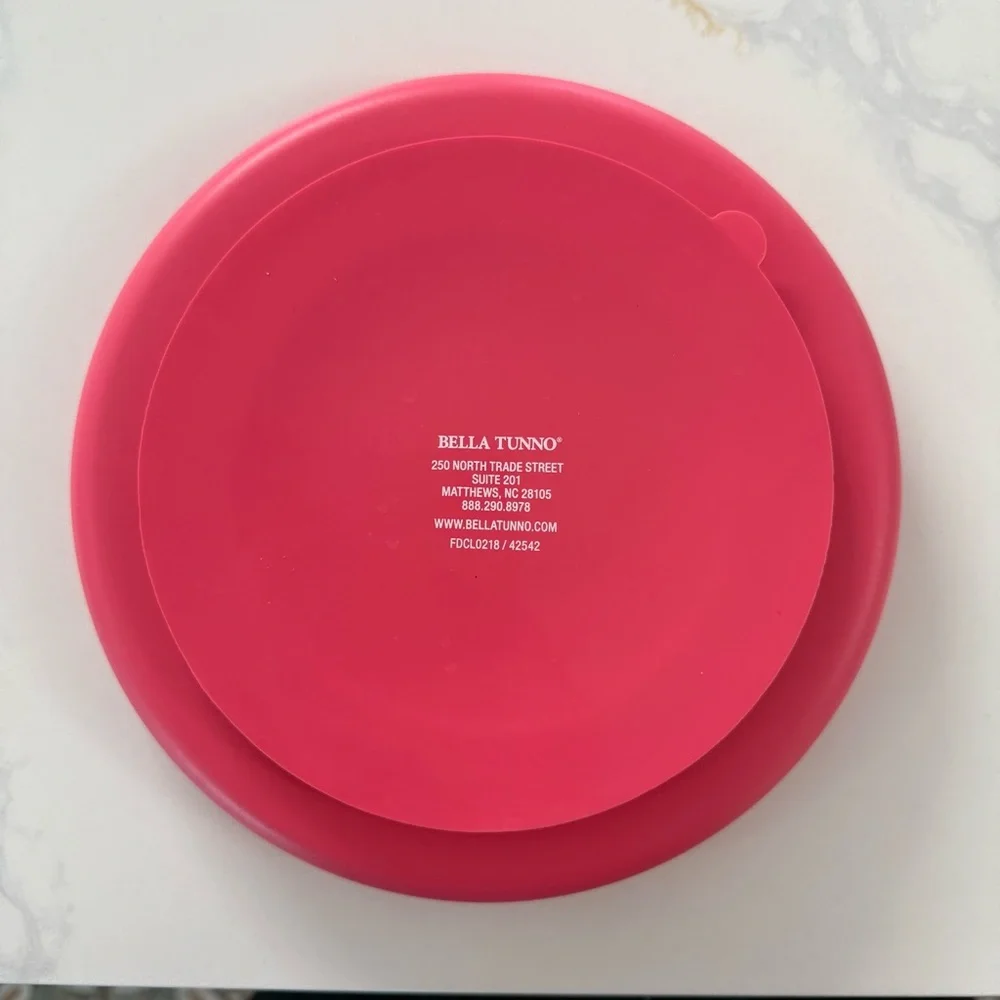 Three Silicone Baby Plates and one Pink Bib